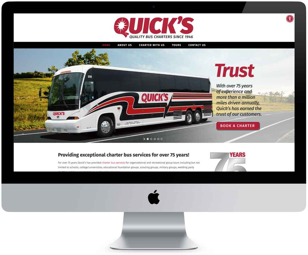 Photo of Quick's Bus website displayed on computer screen