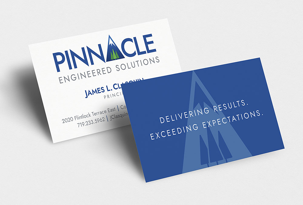 Photo showing the front and back of Pinnacle Engineered Solutions busines cards